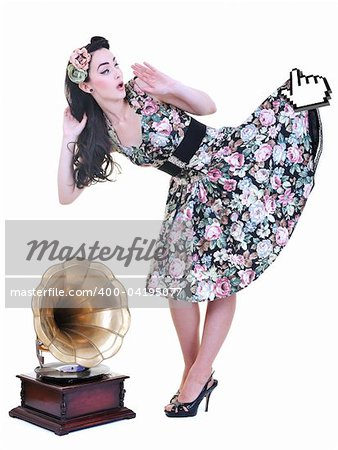 mouse cursor hold in air prety skirt and dress of young beautiful woman isolated on white in studio