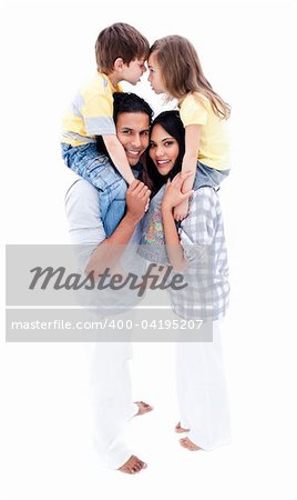 Lively family having fun together against a white background