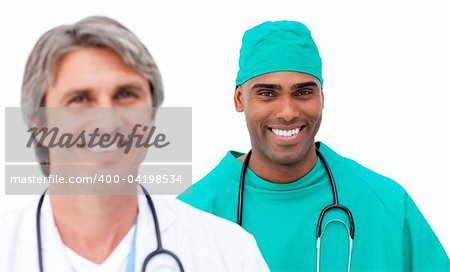 Charismatic male doctors standing in a line against a white background