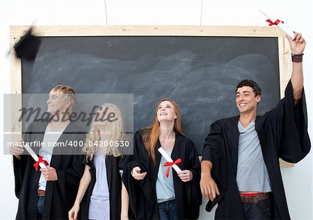 Happy group of people celebrating after Graduation