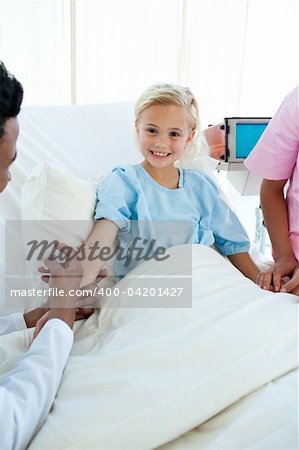 Smiling child patient getting a vaccinate in a hospital Smiling child patient getting a vaccinate in a hospital
