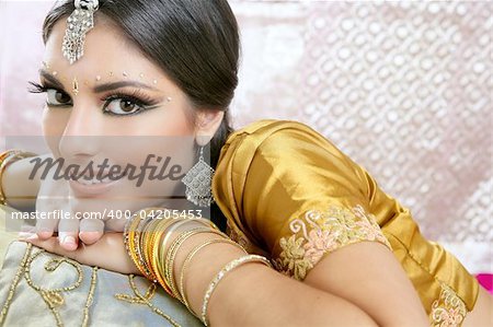 Beautiful indian brunette young woman with traditional fashion