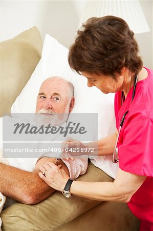 Homebound senior man gets an injection from his nurse.