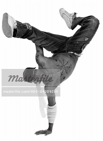 Hip hop dancer freezed his movements on isolated white background