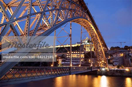 Dom Luis I bridge illuminated at night. Porto, Portugal