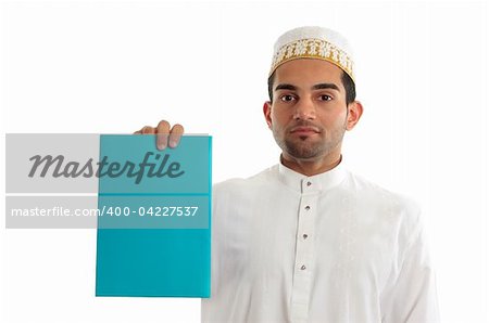 An ethnic mixed race businessman wearing cultural attire is holding a blank document, brochure, advertisement.  White background.