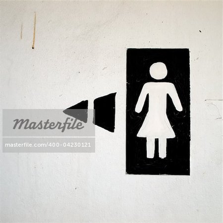 black and white woman toilet sign painting on wall