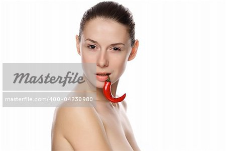 Portrait of a beautiful woman with chili pepper. Isolated on white background
