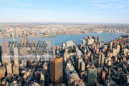 New York City Manhattan skyline panorama aerial view with New Jersey from west Hudson River at sunset with skyscrapers.