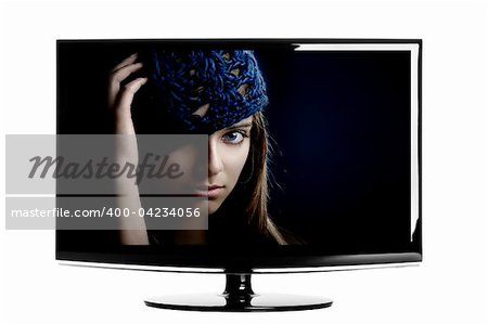 Modern lcd TV showing a beautiful young woman smiling.