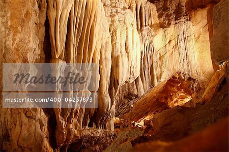 cave stalactites underground cavern magic light in Pyrenees Spain