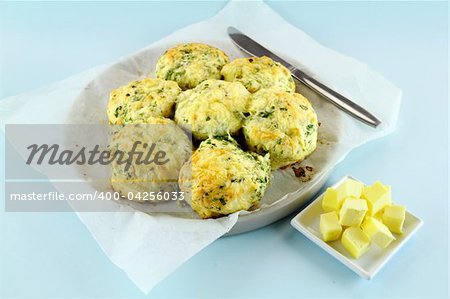 Delicious fresh baked savory cheese and spinach scones ready to serve.