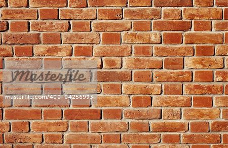 texture with old bricks and natural golden sunlight, focus point on center