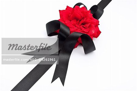 Red rose with black ribbon