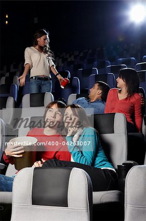 Young people look cinema at a cinema