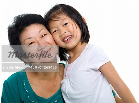 Asian grandmother and grandchild on white background