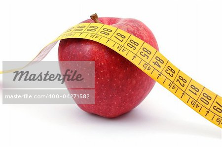 apple and measuring tape isolated on white background