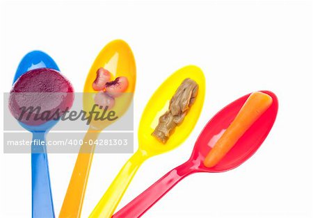 Spoon Full of Vegetables Carrots, Beets, Asparagus and Black Eyes Peas.  Isolated on White with a Clipping Path.