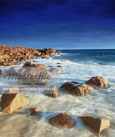 Beautiful seascape. The rocks on a foreground.