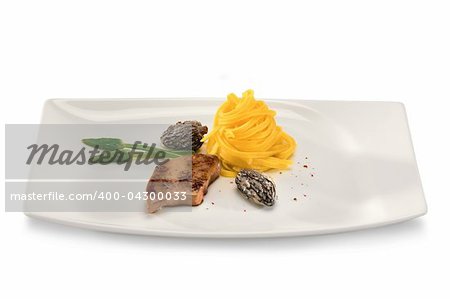 Tasty meat with noodles in a plate isolated on a white background.