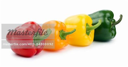 Paprika (pepper) red, orange, yellow and green color isolated on a white background