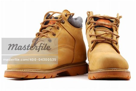 Yellow boots on a thick sole for heavy work and walks.