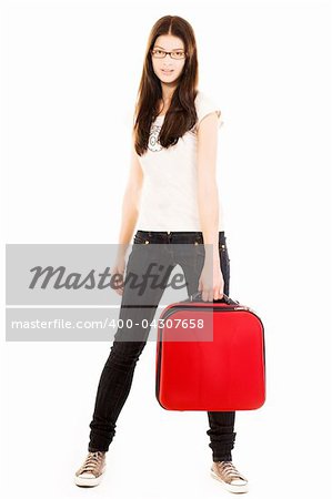 Smiling young girl with suitcase on a white background