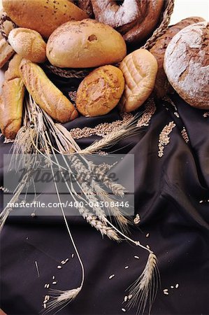 fresh healthy natural  bread food group and wheat plant in studio on table