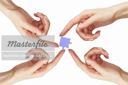 Woman hands with puzzle isolated on white background