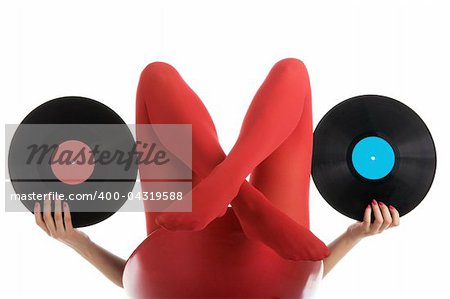 Female feet in red stockings with vinyl record isolated in white
