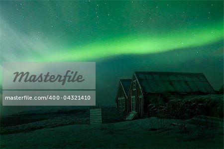 The aurora borealis over a old house in Southern Iceland, Febuary 2011.