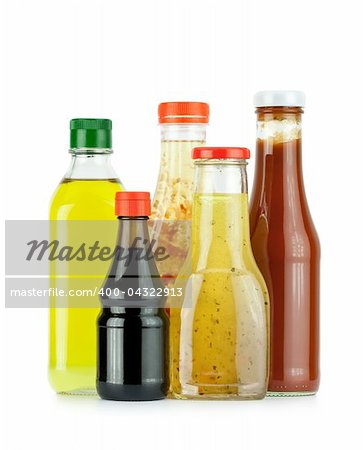 Glass bottles of sauces, oil and ketchup
