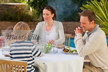 Family eating in the garden