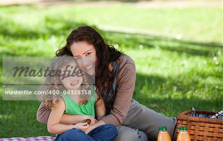 Mother and her daughter picnicking