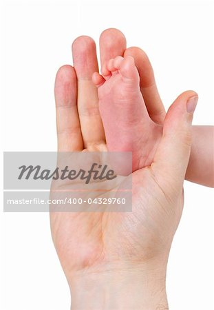 Small leg of the newborn baby girl in the big hand of the father, isolated on a white background