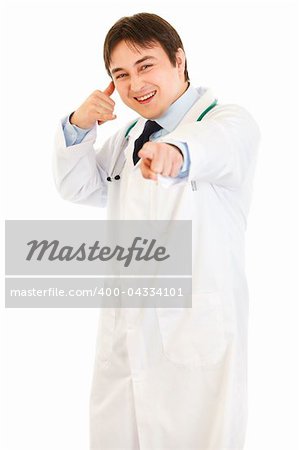 Cheerful medical doctor showing contact me gesture isolated on white