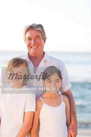 Portrait of a Grandfather with their grandchildren