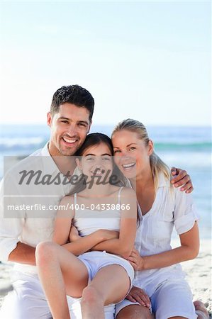 Lovely girl with her parents