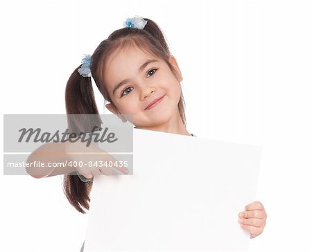 Smiling little girl holding empty white board