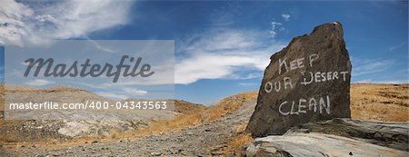 Signs on rocks in the middle of the desert in Namibia