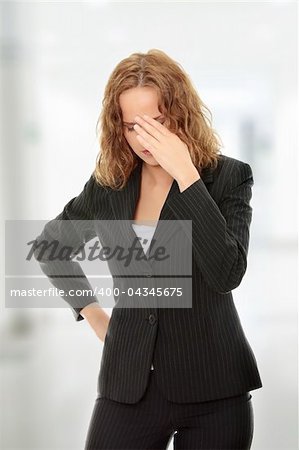 Young business woman with headache