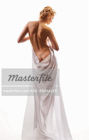 naked beautiful woman in a sheet on a white background
