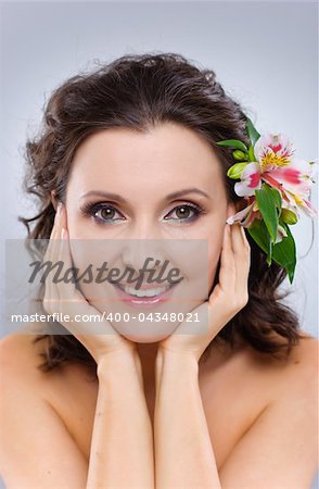 Close-up of woman green eye with Pink flowers