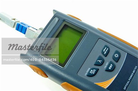 Close up of Optical Power Meter isolated on white background. This equipment used to measure the optical loss for internet installation using fiber optic cable