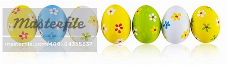 Hand painted green, white, yellow easter eggs isolate
