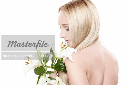 Closeup portrait of female model holding white orchid