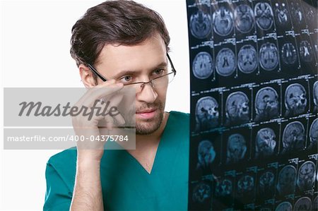 Doctor in glasses with x-ray patient