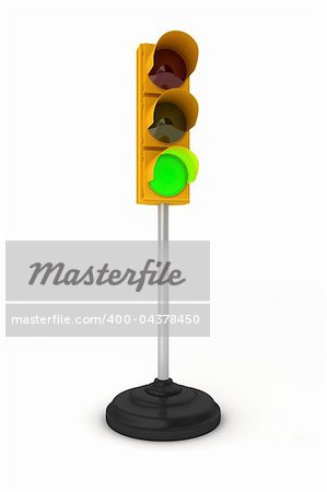 Toy traffic light over white background showing green light