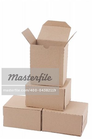 Brown cardboard boxes arranged in stack on white background