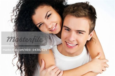 beautiful young couple in love  on white